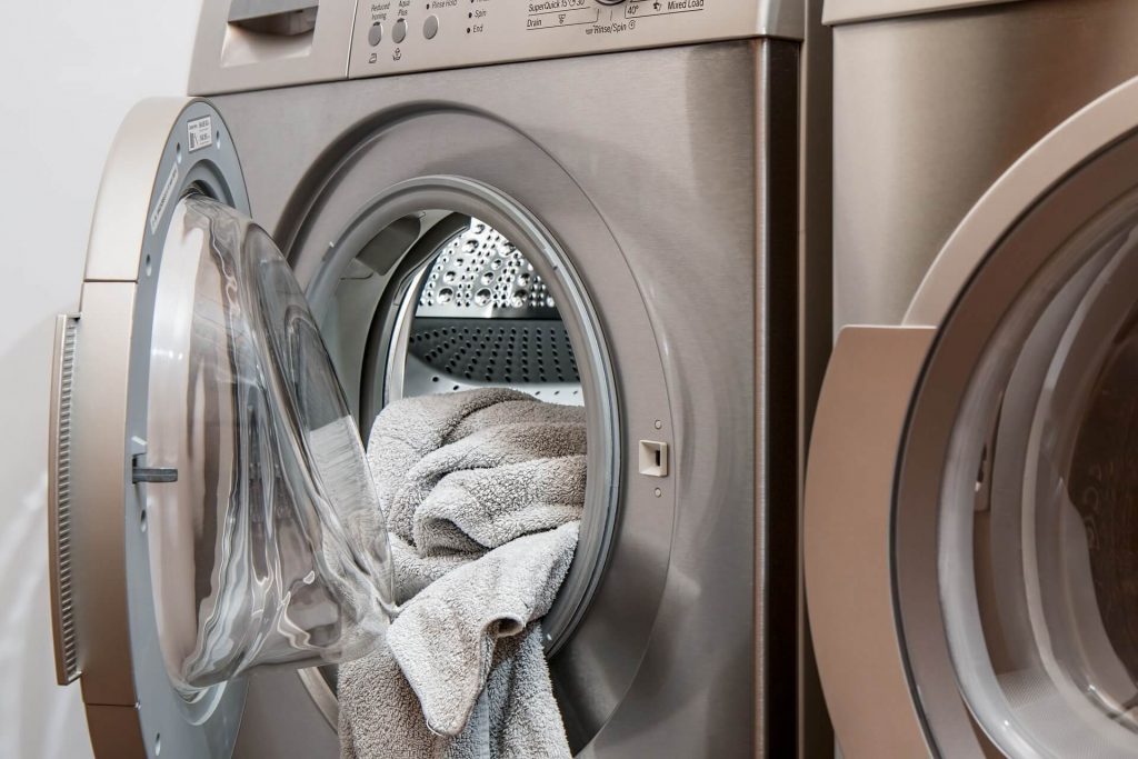 washing machines with clothes inside