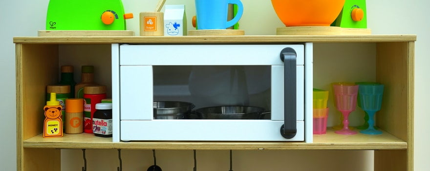 microwave oven on a shelf